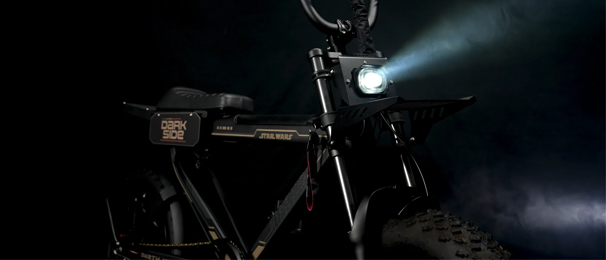 Darth Vader Flying Rocket, its headlight cutting through the dark